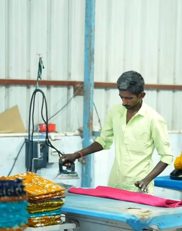 Garments steam-pressed and inspected before wholesale packing