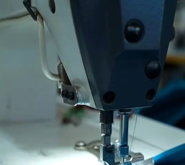 High-speed Singer lockstitching machine in operation